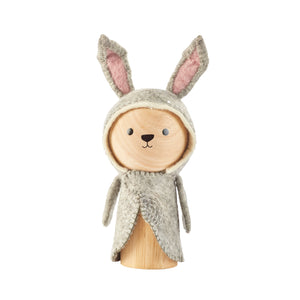 Evan the Rabbit is a wooden animal toy. His wooden body is wrapped in a removable wool rabbit outfit