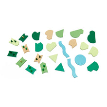 A top down image of flat rectilinear shapes that represent parks and green spaces when used with other blockitecture blocks. Blocks are painted green, light brown, and blue. 