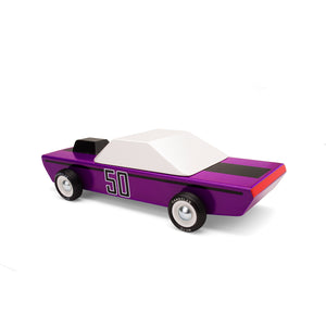 A purple wooden car viewed from behind. Red tail lights are painted on the rear, and the number 50 is shown on the driver-side door.
